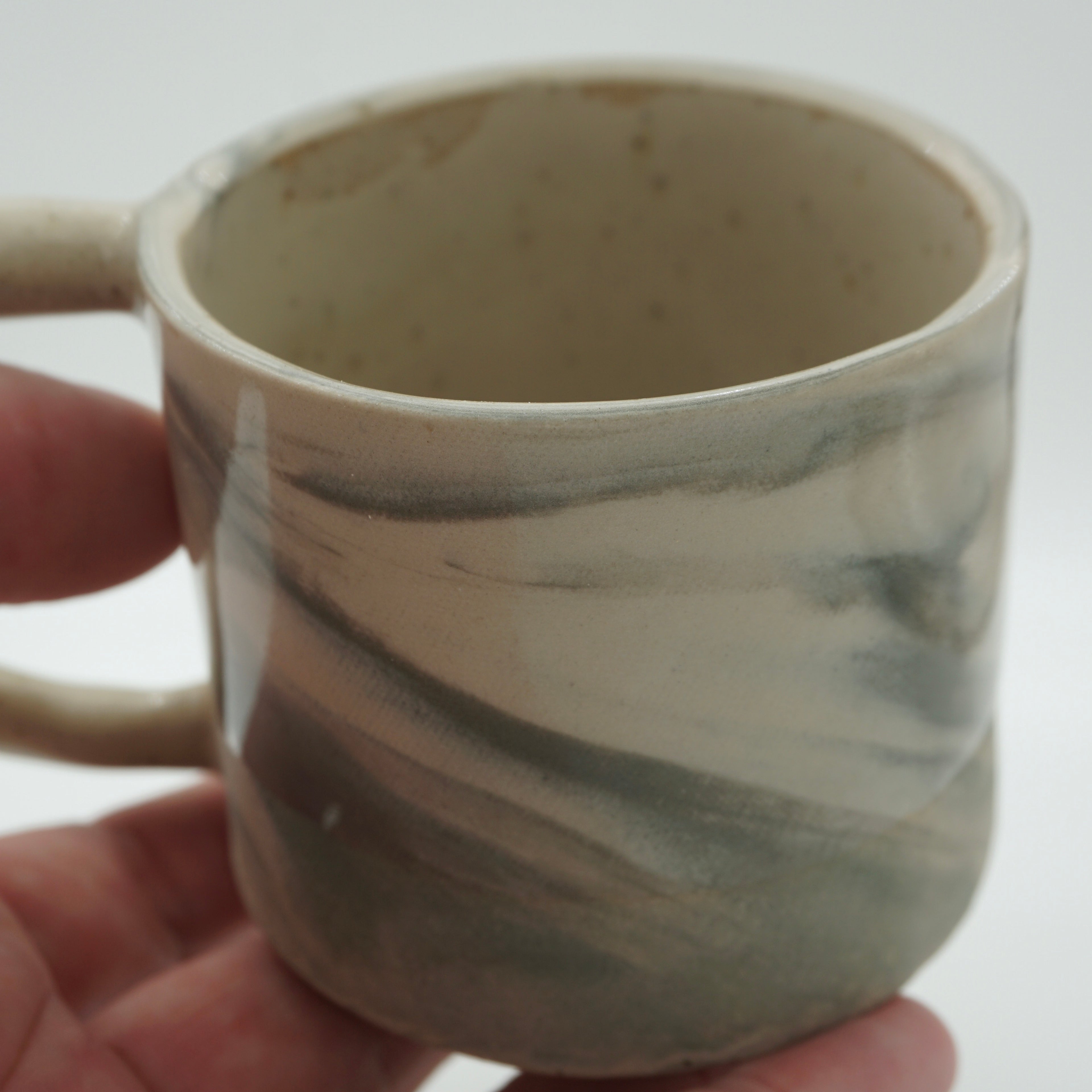 Kleine Tasse mit Henkel