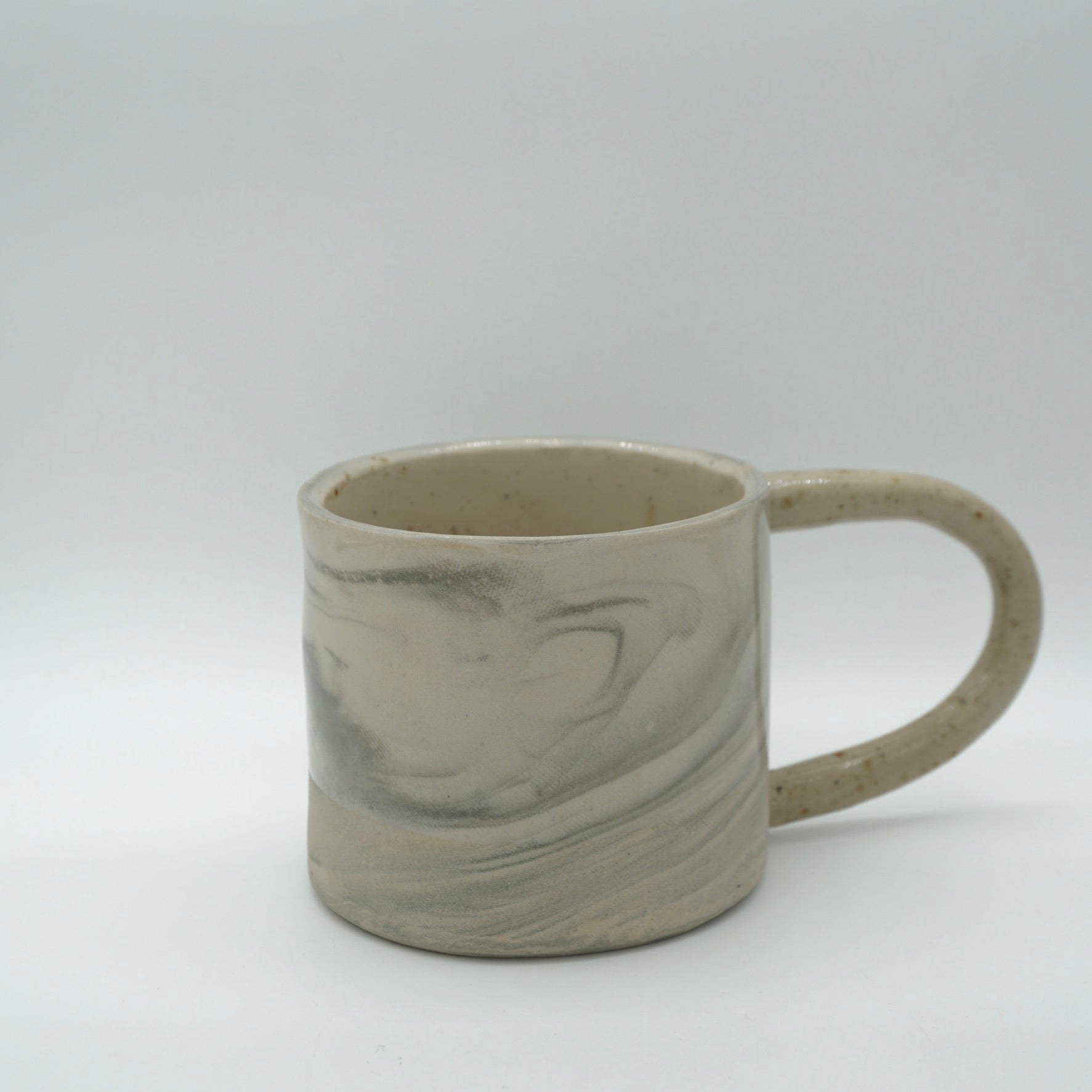 Kleine Tasse mit Henkel