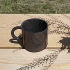 Kleine Tasse mit Henkel