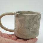 Kleine Tasse mit Henkel