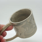 Kleine Tasse mit Henkel