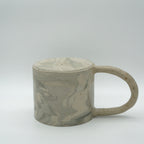 Kleine Tasse mit Henkel