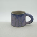 Kleine Tasse mit Henkel