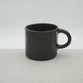 Kleine Tasse mit Henkel